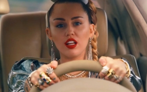 Watch Miley Cyrus' Wild Attempt to Escape Police in 'Nothing Breaks Like a Heart' Music Video