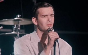 Watch Matty Healy's Bizarre Journey Onstage in The 1975's New Music Video