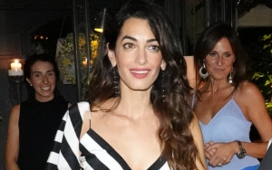 Hands-On Mom Amal Clooney Holds Her Twins by Herself in NYC