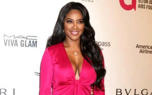 Kenya Moore Mom-Shamed for Kissing and Holding Her Baby Incorrectly