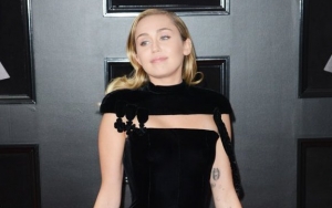Watch: Miley Cyrus Throws a Feminist Spin to 'Santa Baby' Performance
