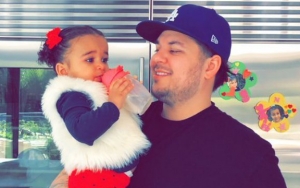 Rob Kardashian Snuggles to Daughter Dream in Rare Appearance at Family's Christmas Celebration