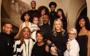 Eddie Murphy's Daughter Shares a Look at 10th Sibling With Family's Christmas Photo