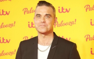 Robbie Williams Reminds Fans He Has Kids in Response to Cocaine Use Question