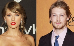 Taylor Swift Seen Braving the Rain With Joe Alwyn After Night Out at Pub