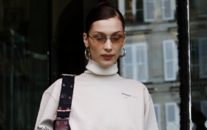 Bella Hadid Shakes Off 101-Degree Fever When Hitting Runway at Paris Fashion Week 