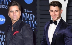 John Stamos Jokingly Blames Nick Jonas for Ripped Pants Mid-Concert