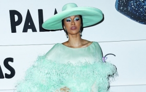Cardi B Sparks Pregnancy Rumor With Her Suspiciously Belly-Hiding Dress