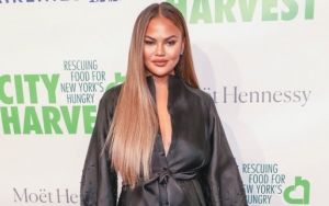 Chrissy Teigen Heckled by Anti-Fur Activist Who Calls Her 'Heartless Murderer' 