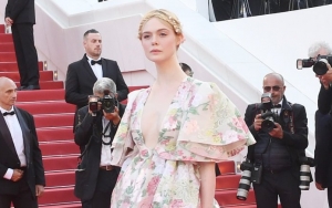 Elle Fanning Updates Fans With Thumbs-Up Selfie After Fainting at Cannes Dinner Party