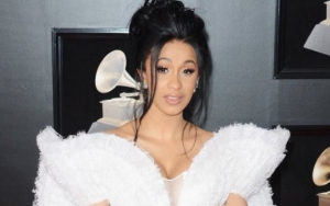 Cardi B Fiercely Claps Back at Hater Accusing Her of Using Ghostwriters