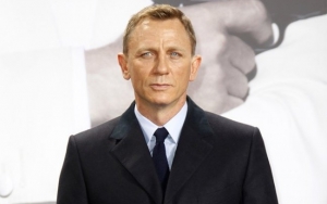 Injured Daniel Craig Spotted on Crutches at New York Airport