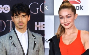 Joe Jonas Checks Gigi Hadid on Paris Fashion Week's Runway Ahead of France Wedding