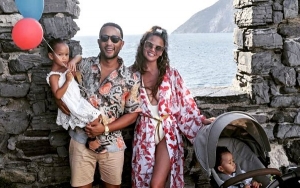 Chrissy Teigen and John Legend Flaunting PDA in Steamy Fourth of July Celebration
