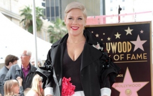 Pink Wins Supports for Photo of Her Children Running Around Holocaust Memorial