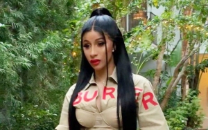 Cardi B Jokes About Her Breast Implants as She Proudly Displays Boobs