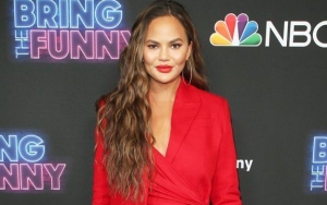 Chrissy Teigen in War of Words With Troll Who Calls Her 'Slave'