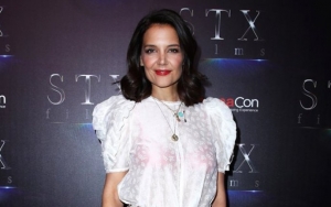 Katie Holmes Flashes Bra in Revealing Outfit During Outing With Suri Cruise
