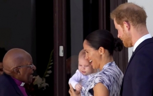 Baby Archie Gets a Kiss From Desmond Tutu in First South African Appearance