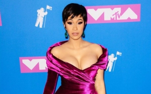 Cardi B Mocked for Her Bizarre Head-to-Toe Floral Outfit at Paris Fashion Week