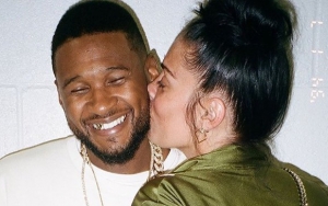New Girlfriend? Usher Puts on Loved-Up Display With Mystery Woman