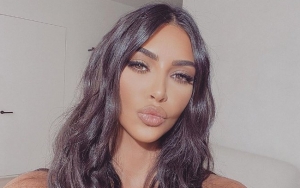 Watch Kim Kardashian Get Her Hair Cut With Craft Scissors in Parking Lot