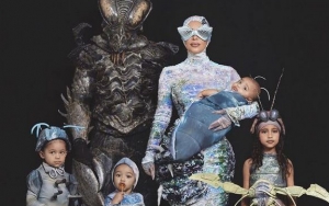 Kim Kardashian Wears Bra-Like Goggles as Worm in New Halloween Costume With Her Family