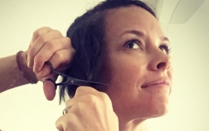 Watch: Evangeline Lilly Picks Up Scissors and Starts Hacking Her Own Hair