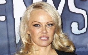 Pamela Anderson's Native American-Inspired Halloween Outfit Draws Criticism