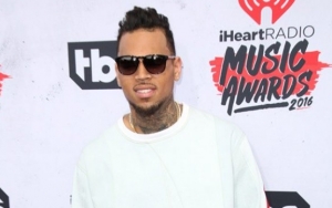 Chris Brown Carries On With Garage Sale Despite Police's Attempt to Shut It Down  