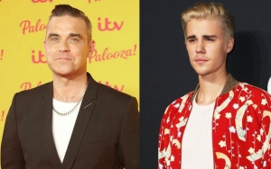 Robbie Williams Takes a Jab at Justin Bieber Over Christmas Album