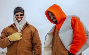Kanye West Takes His Dad on ATV Ride in 'Follow God' Music Video