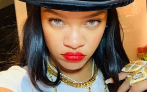 Rihanna Says She Has 'Overwhelming' Year, Snaps at Her Friend Who Asks About New Album