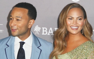 Watch: Chrissy Teigen Unimpressed as John Legend Shows Off His Abs