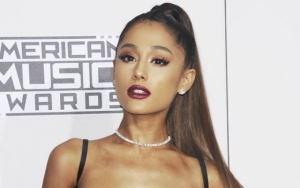Ariana Grande Takes Onstage Tumble in Stride