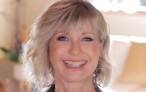 Olivia Newton-John in Tears When Auction Winner Gifts Her Back Her 'Grease' Jacket 