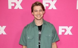 Joe Alwyn Jumps Into Freezing Pond for Christmas