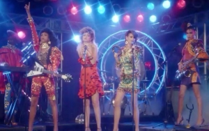 Watch: Gigi and Bella Hadid Form '80s Glam Band With Kaia Gerber for New Moschino Ad