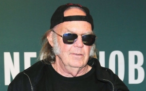 Neil Young Sworn In as U.S. Citizen After Delay Over Marijuana Use  