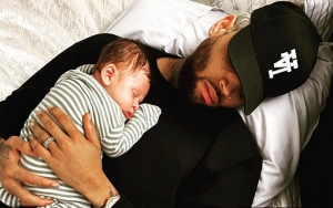 Chris Brown Debuts New Hand Tattoo Inspired by His Son Aeko