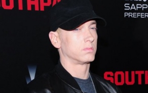 Eminem Gets Called Out by Grindr for 'Revealing' Profile Photo on Gay Dating App