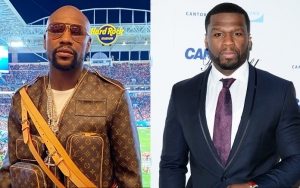 Floyd Mayweather Is Trolled for His Louis Vuitton Outfit, 50 Cent Jumps In