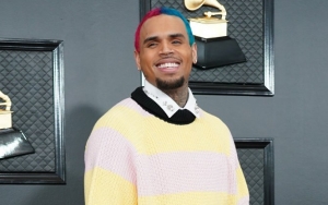 Chris Brown Adds Air Jordan Sneaker Tattoo to His Face