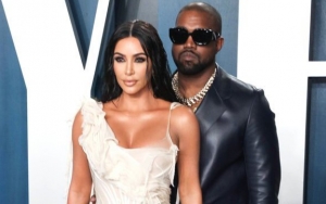 Kim Kardashian Attempts to Kiss Kanye West at NBA All-Star Game, He Ignores Her