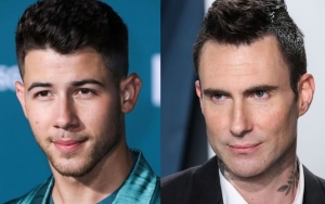 Nick Jonas Gets Trolled by Adam Levine for Performing at the Grammys With Spinach in His Teeth