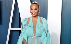 Chrissy Teigen Shelves Thought of Another Boob Job Over Fear of Dying 