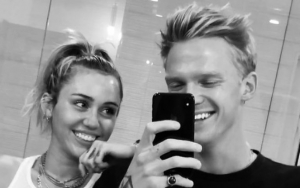 Miley Cyrus and Cody Simpson Get Matching Trident Tattoos
