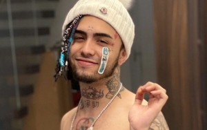 Lil Pump Fuels Transgender Rumors With Purse Photo