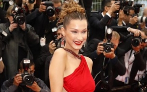Bella Hadid Urges Fans to Stay Home With New Topless Photo