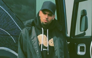 Watch: Chris Brown Gets Into Heated Argument With Fan Trying to Sneak Into His Home